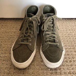 Vans off the Wall green suede high tops.